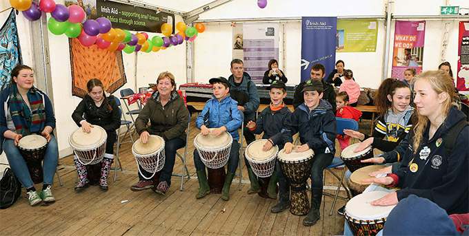 Children participating in an Irish Aid run drumming workshop at the 2015 National Ploughing Championships.