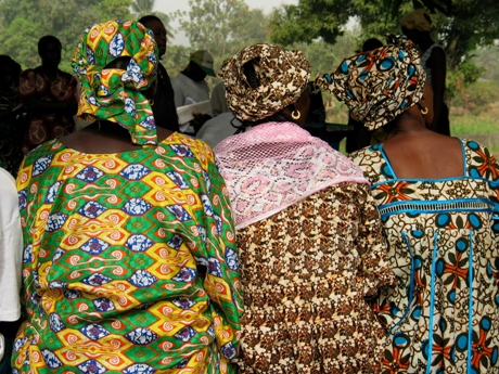 Three women from Sierra Leone dressed in colourful clothes. Photo: 2004