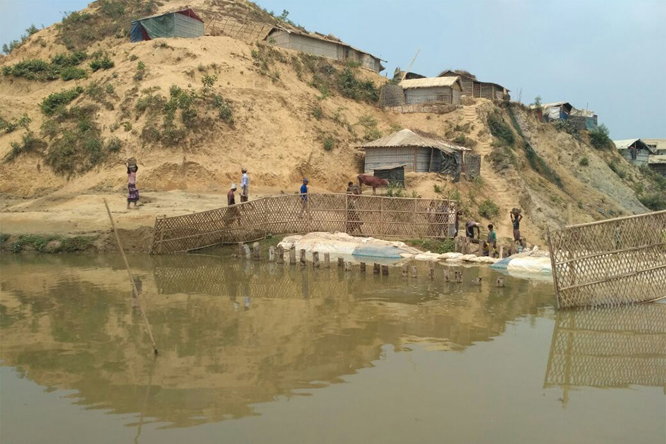 Photo of recently constructed temporary DAM to retain water at Nayapara, Refugee camp