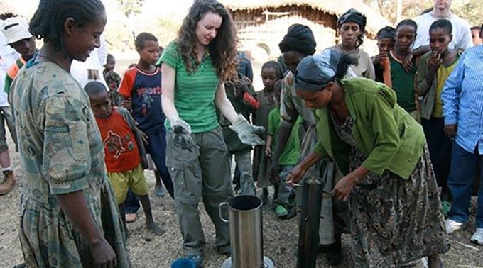 2008 winner Tara McGrath, Presentation School, Kilkenny, demonstrates her fuel-efficient pressure stove in Ethiopia.